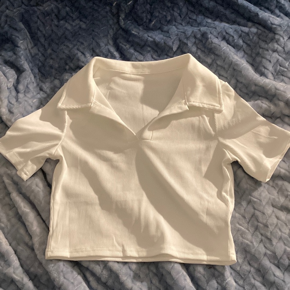 The color is white , it’s from SHEIN, the quality is good , has never been worn
